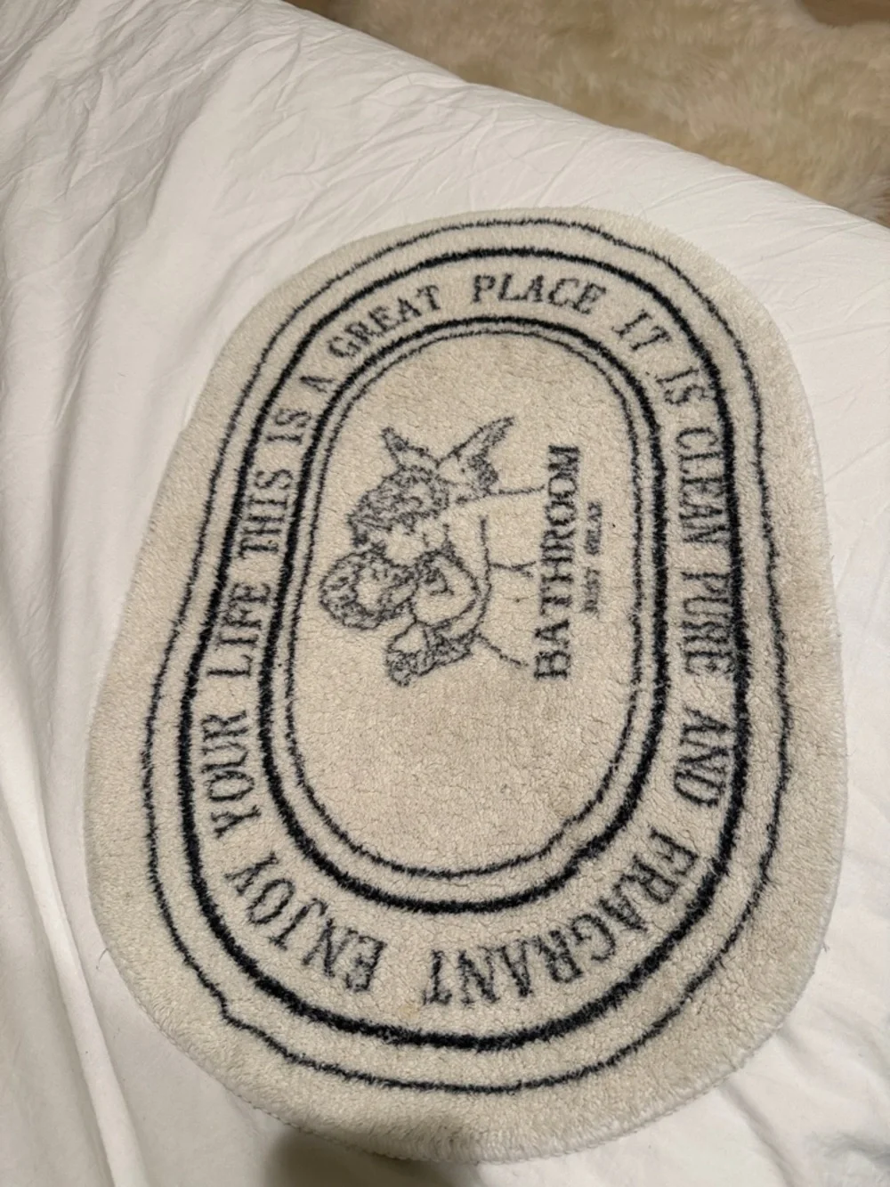 Bathroom Oval Cream Bath Mat with Navy Script